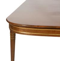 A Louis XVI Style Gilt Bronze Mounted Mahogany Dining Table