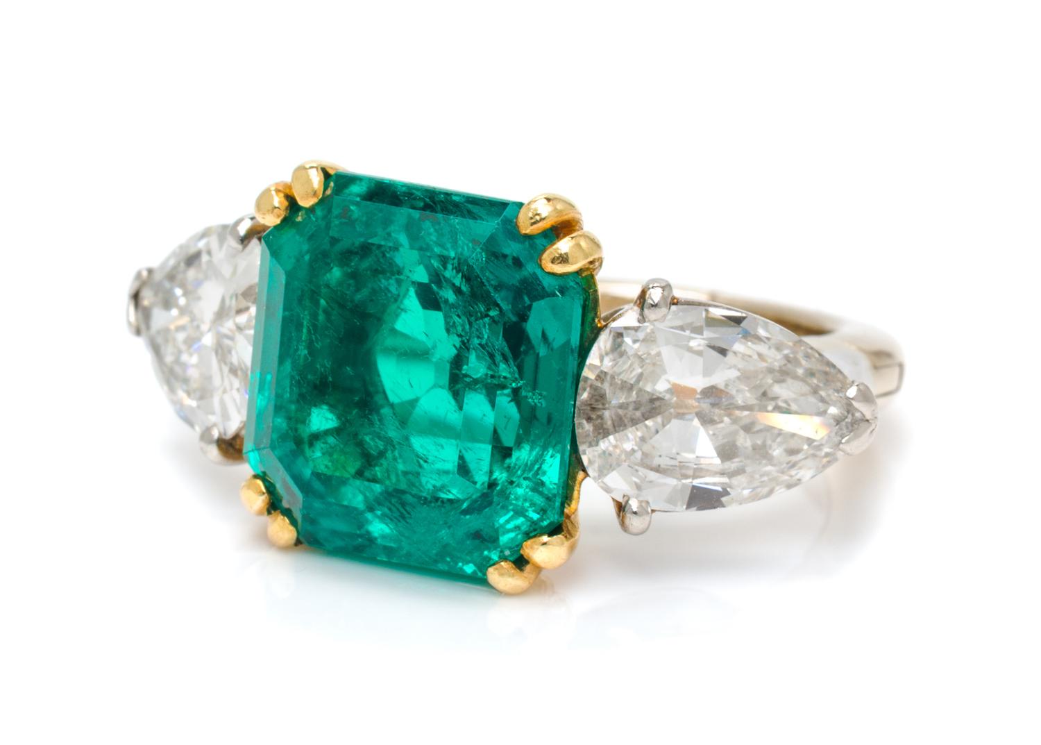A Fine Platinum, Yellow Gold, Colombian Emerald and Diamond Ring, 4.20 dwts.