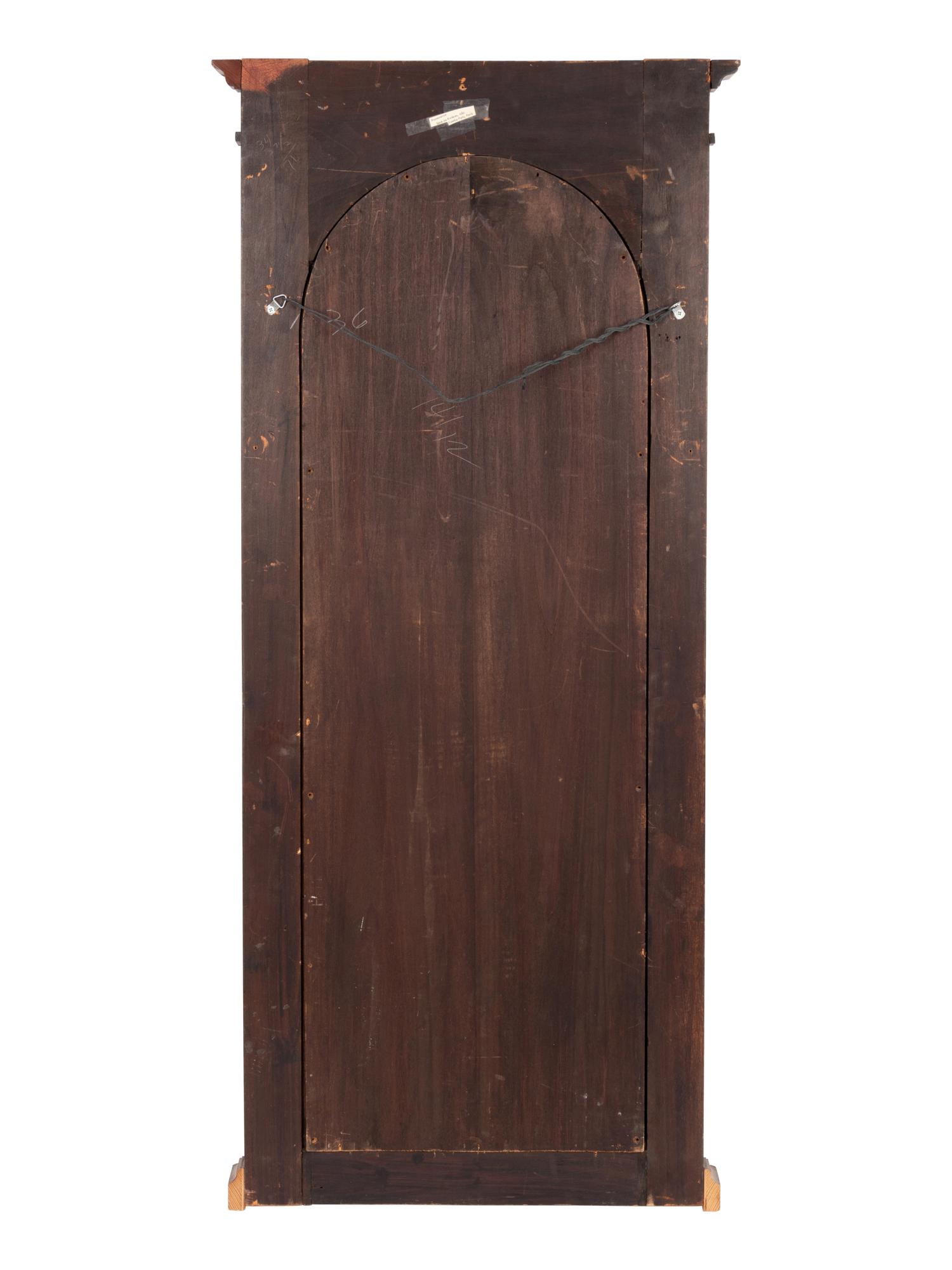 An Empire Style Gilt Metal Mounted Mahogany Mirror