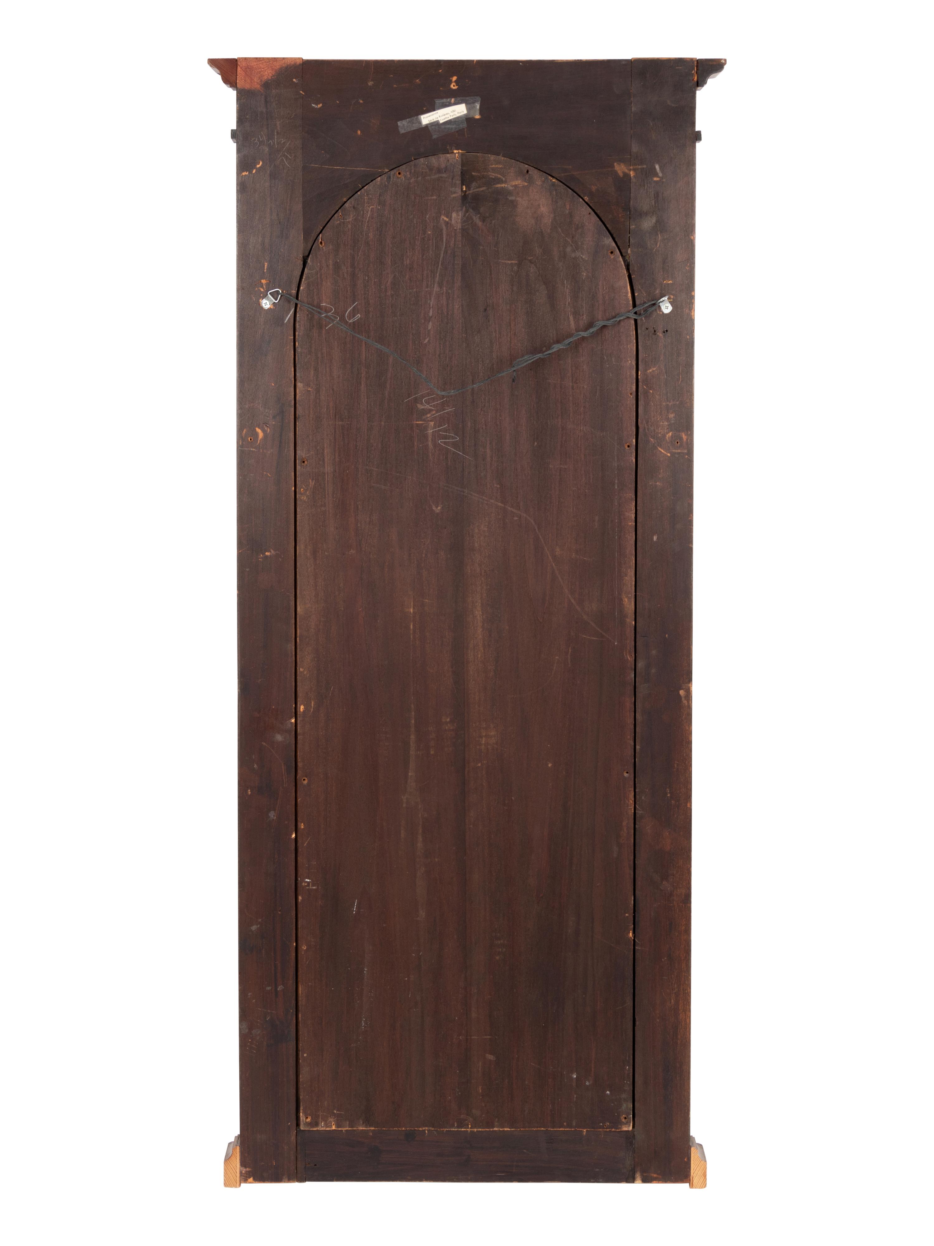 An Empire Style Gilt Metal Mounted Mahogany Mirror