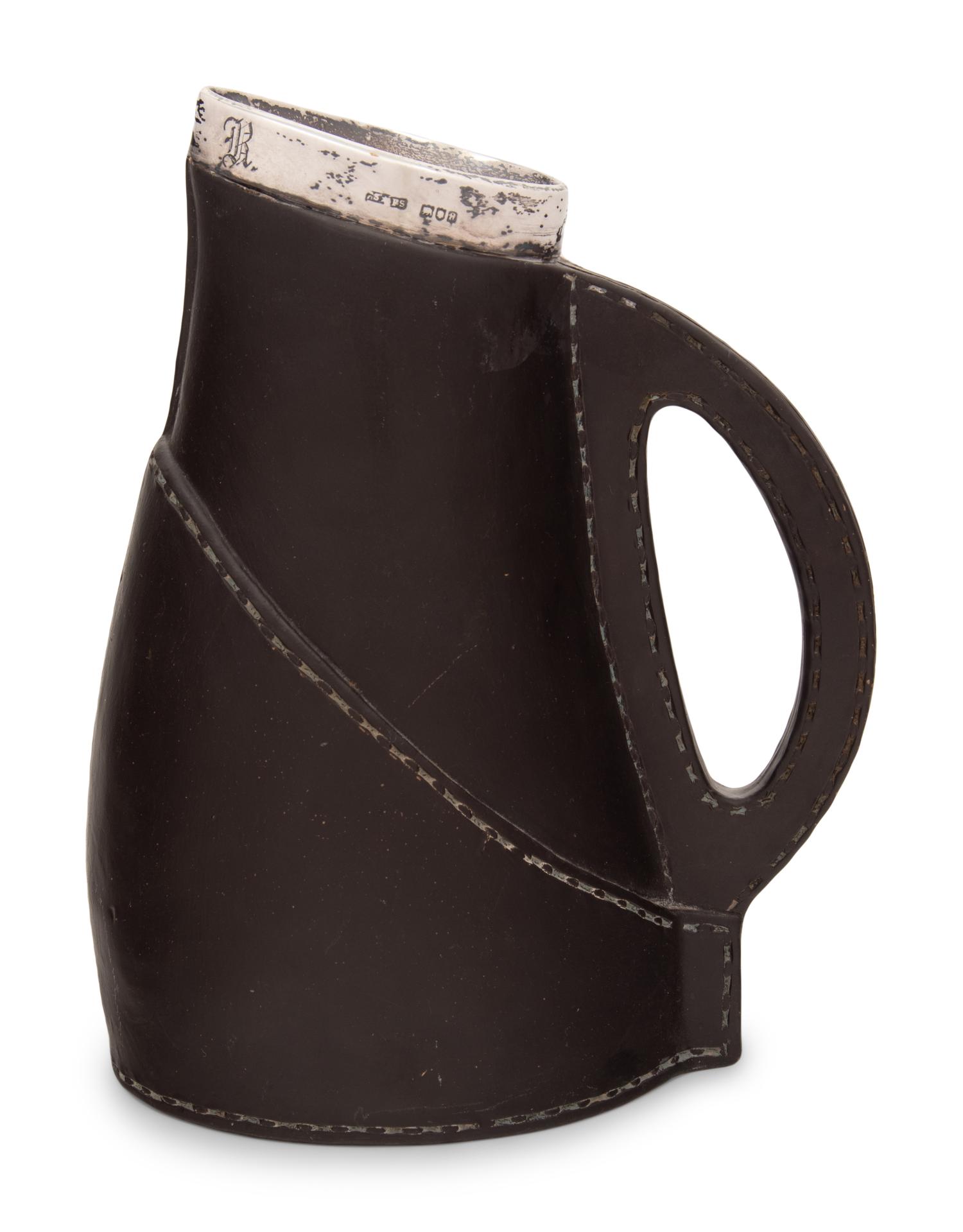 A Doulton Lambeth Silver Mounted Ceramic 'Blackjack' Pitcher