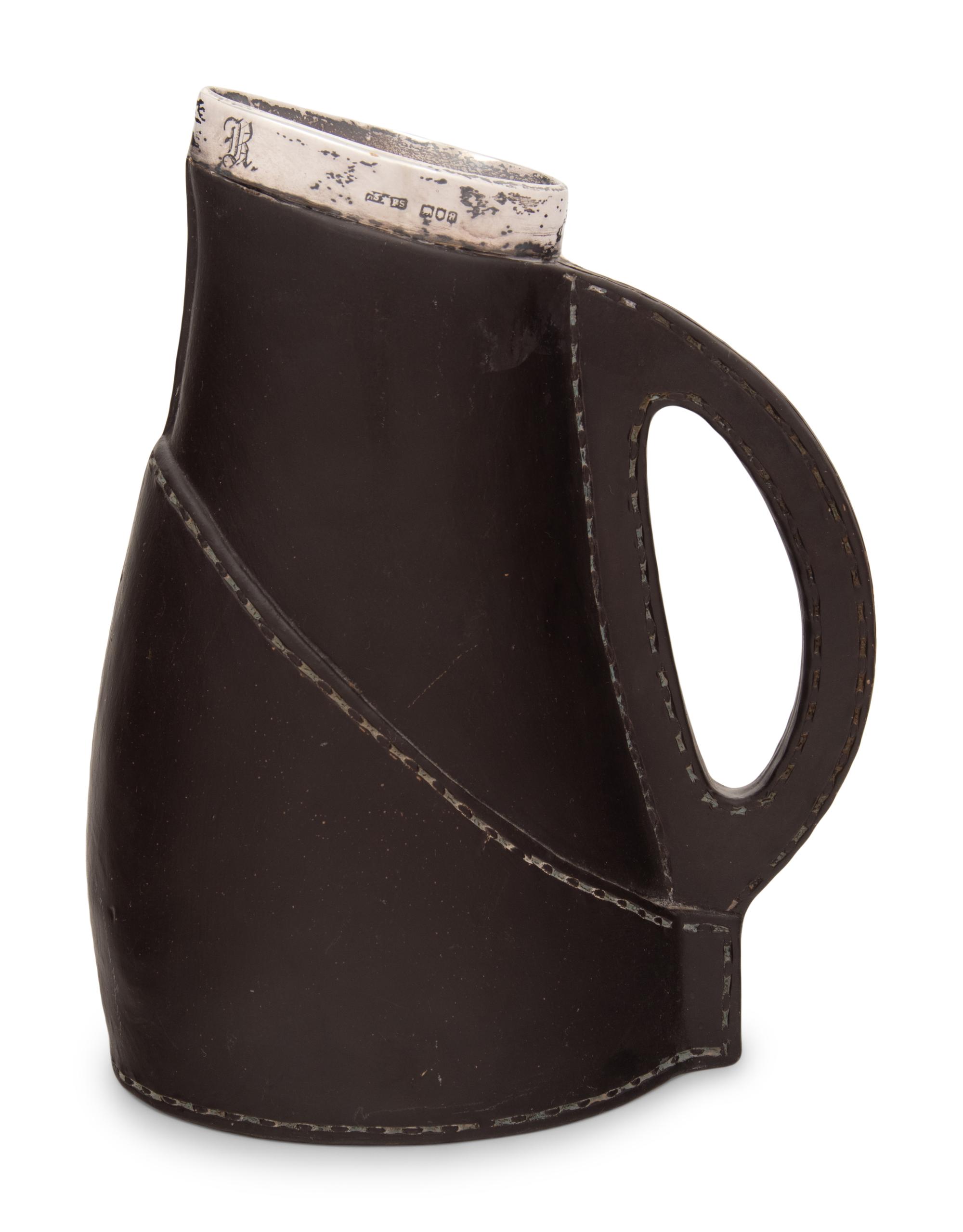 A Doulton Lambeth Silver Mounted Ceramic 'Blackjack' Pitcher