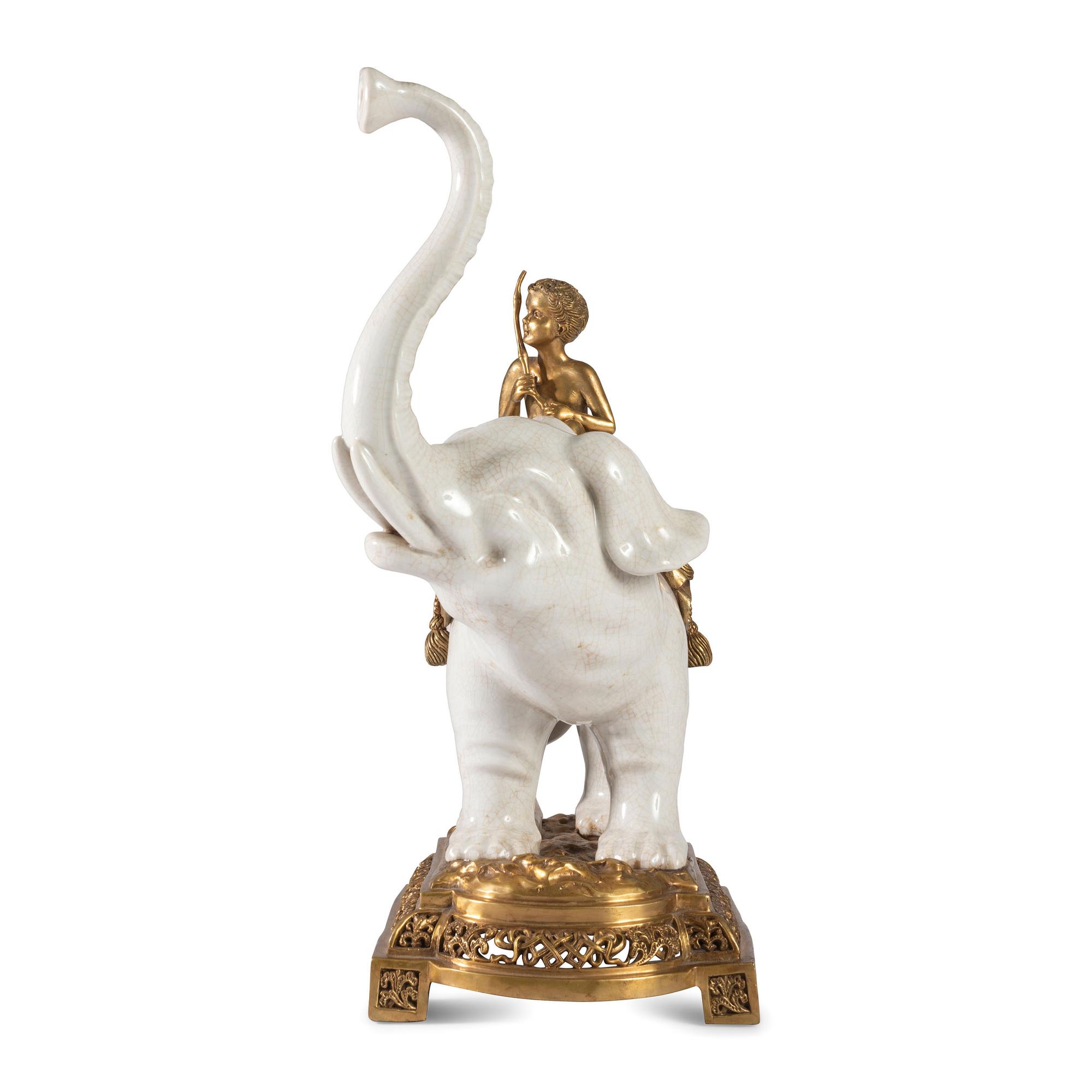 A Brass and Earthenware Elephant Figure