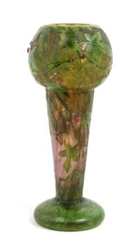 Daum, EARLY 20TH CENTURY, enameled and applied cameo glass vase, of baluster form decorated with berry laden leafy branches,