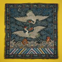 A Pair of Korean Embroidered Silk 'Double Crane' Rank Badges and a Vietnamese Salmon Pink Ground Embroidered Silk 'Crane' Rank Badge, Late 19th Century — 十九世紀晚期 朝鮮王朝文官鶴紋補子一對及越南鶴紋補子