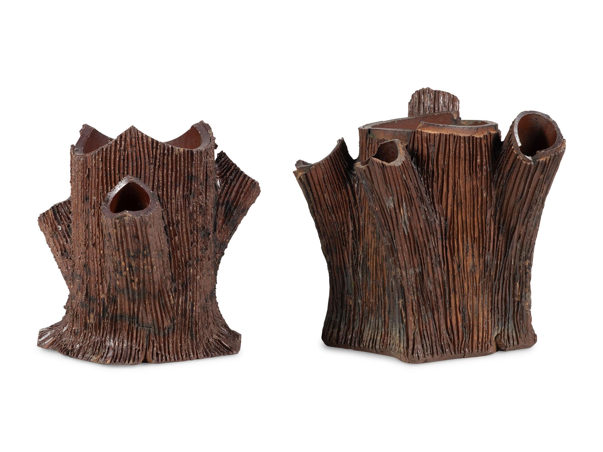 A Pair of Glazed Sewer Tile Treetrunk-Form Lawn Ornaments