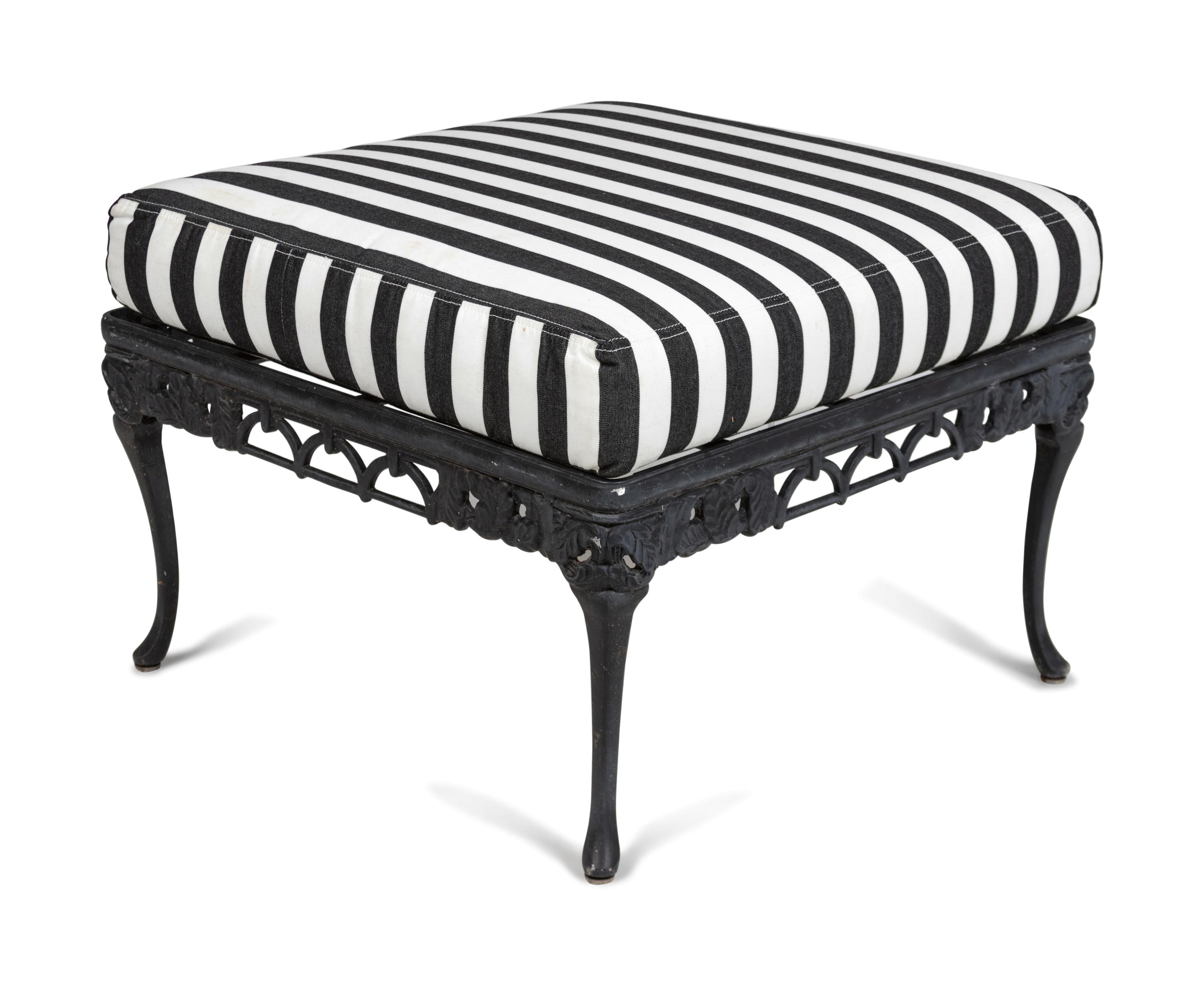 A Pair of Metal Garden Chairs and an Ottoman