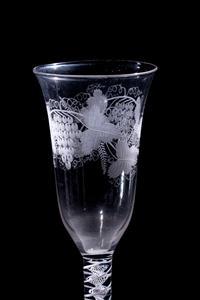 A Set of Seven Engraved Glass Cordials with Twist Stems
