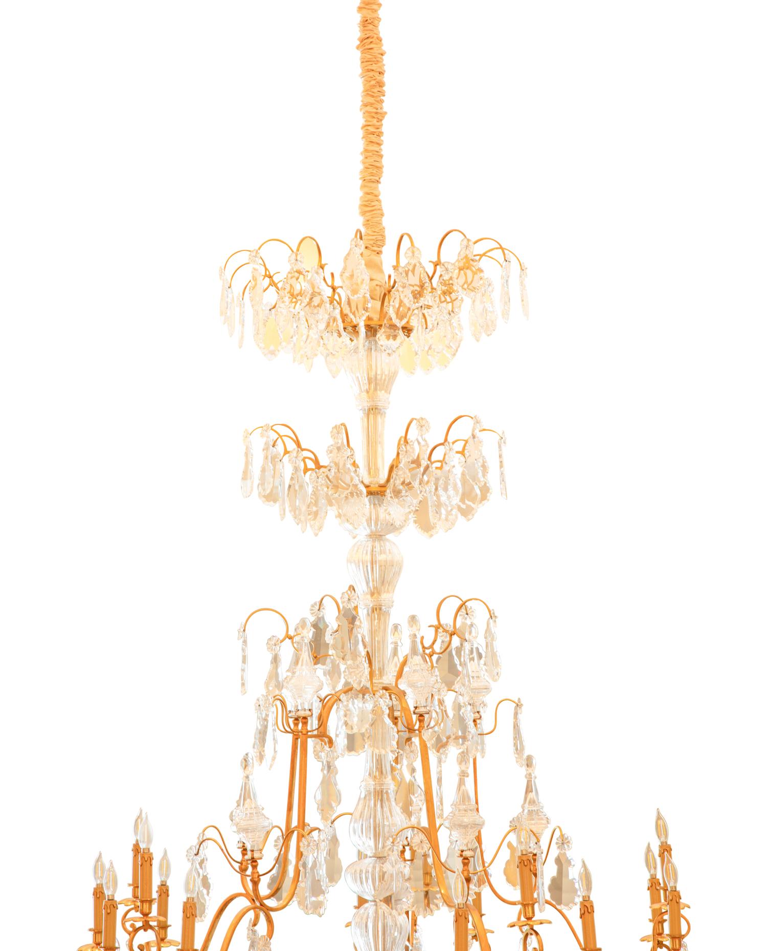 A Massive Gilt Bronze and Baccarat Cut Glass Chandelier from Hôtel Claridge, Paris