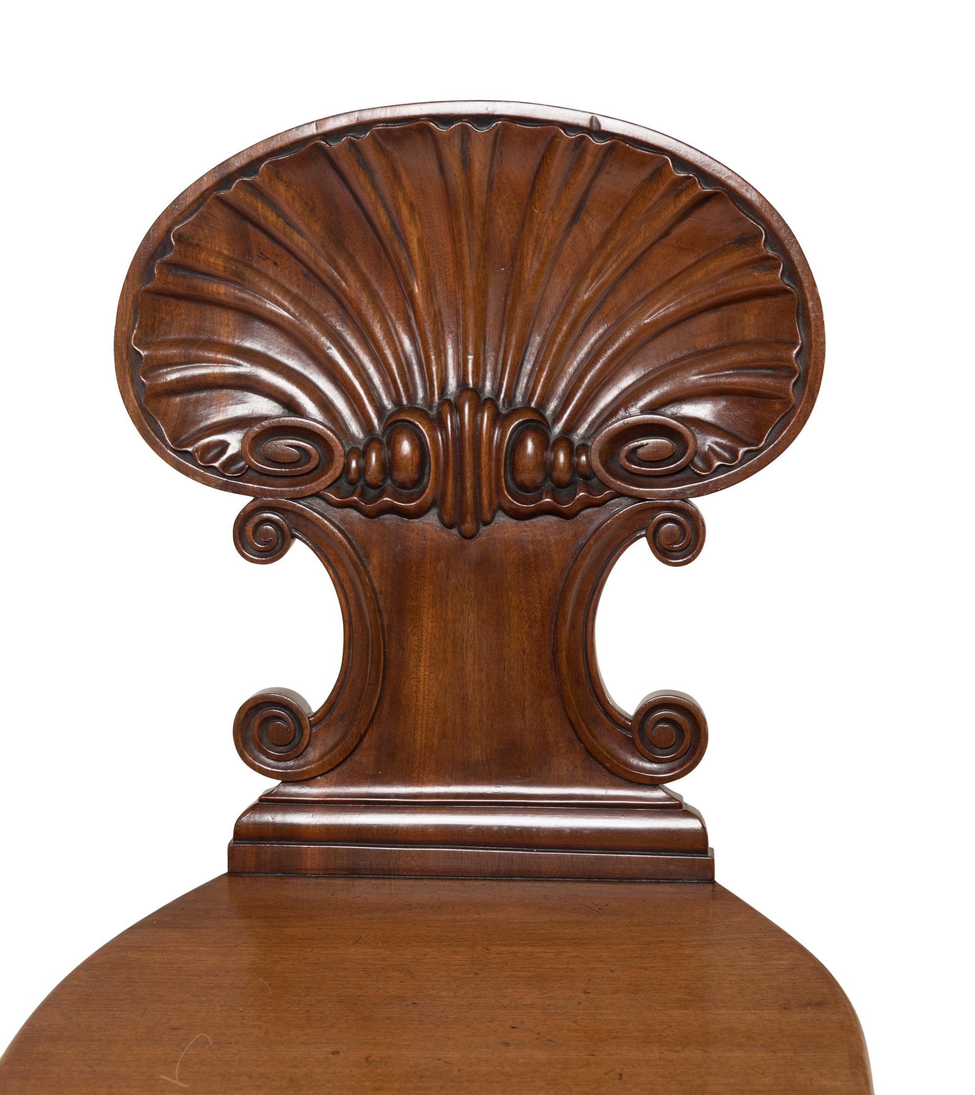 A Pair of Regency Mahogany Hall Chairs