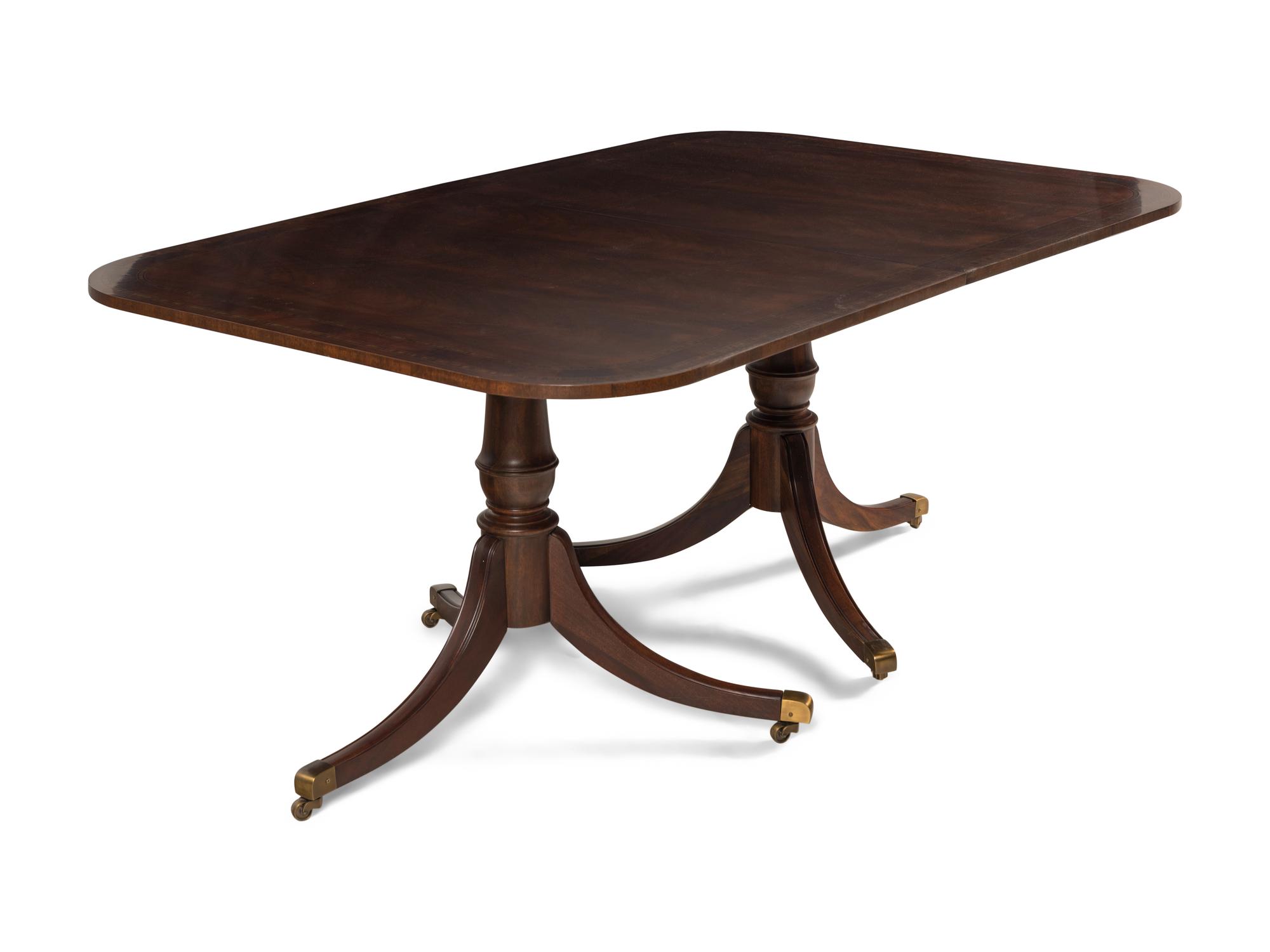 A Regency Style Double Pedestal Dining Table