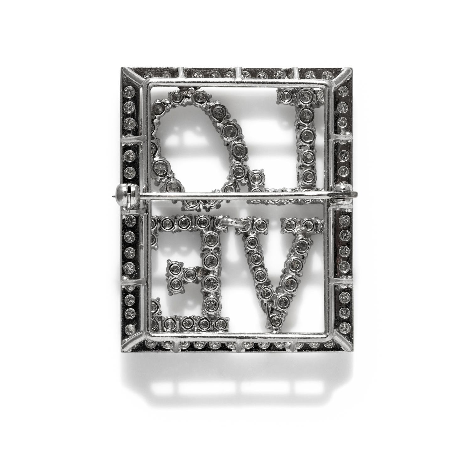 PLATINUM AND DIAMOND 'LOVE' PIN