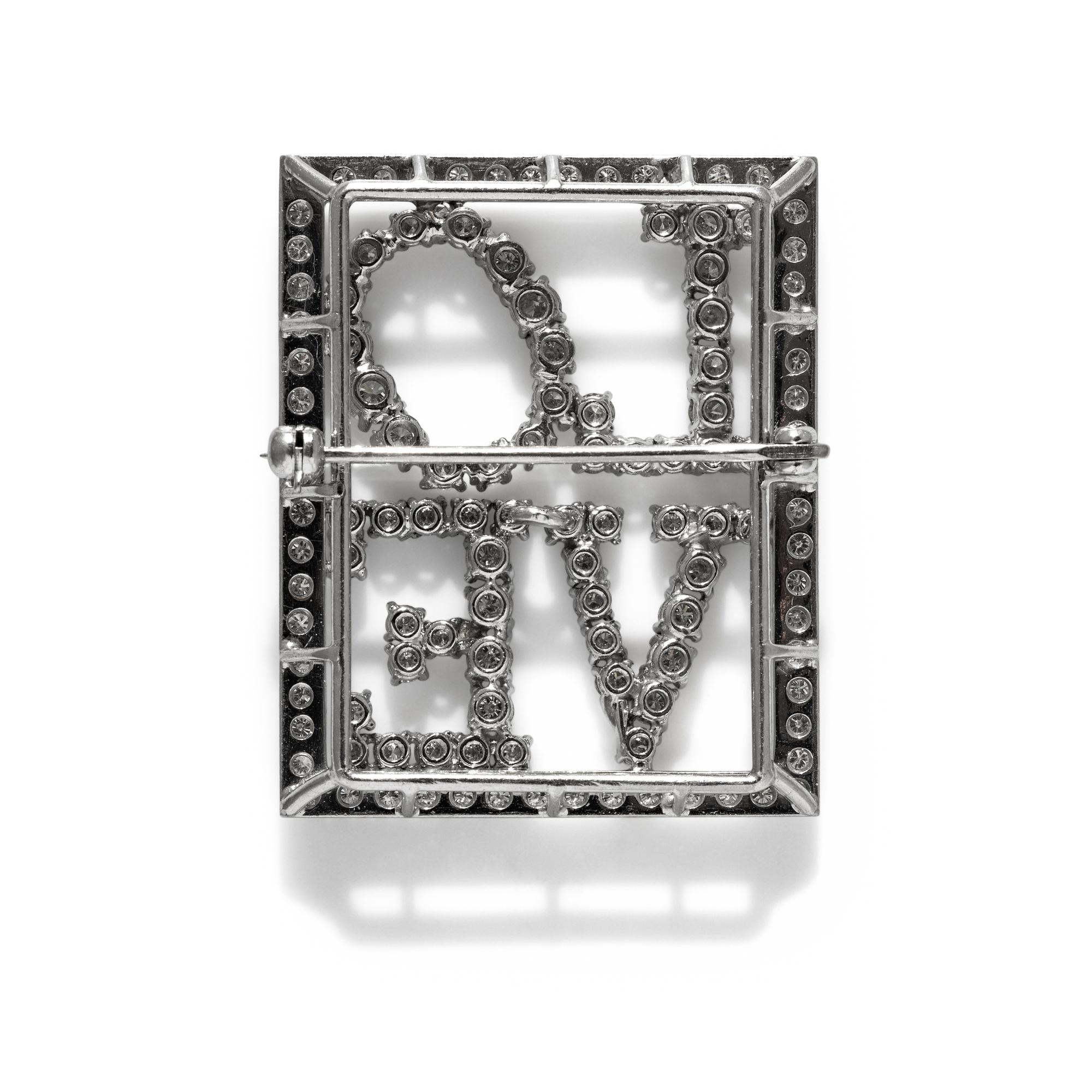 PLATINUM AND DIAMOND 'LOVE' PIN
