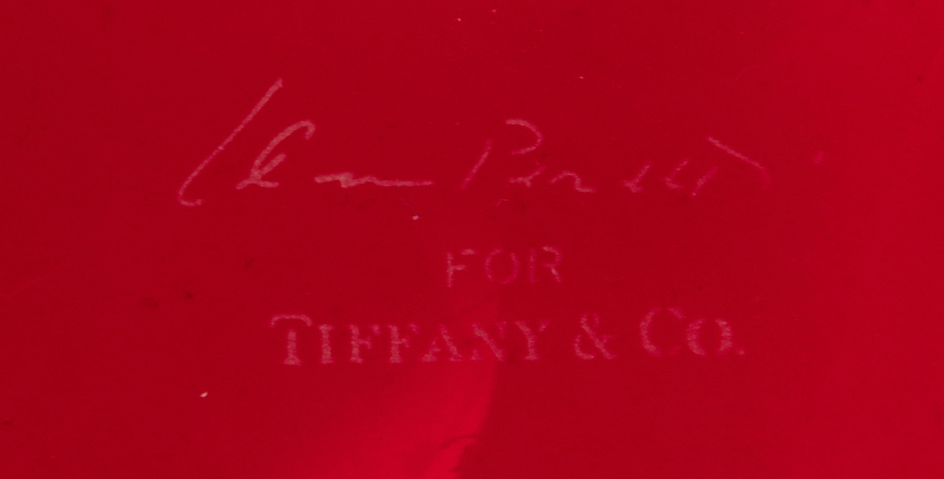 Tiffany & Co.; A Paperweight, Table Box, and Picture Frame