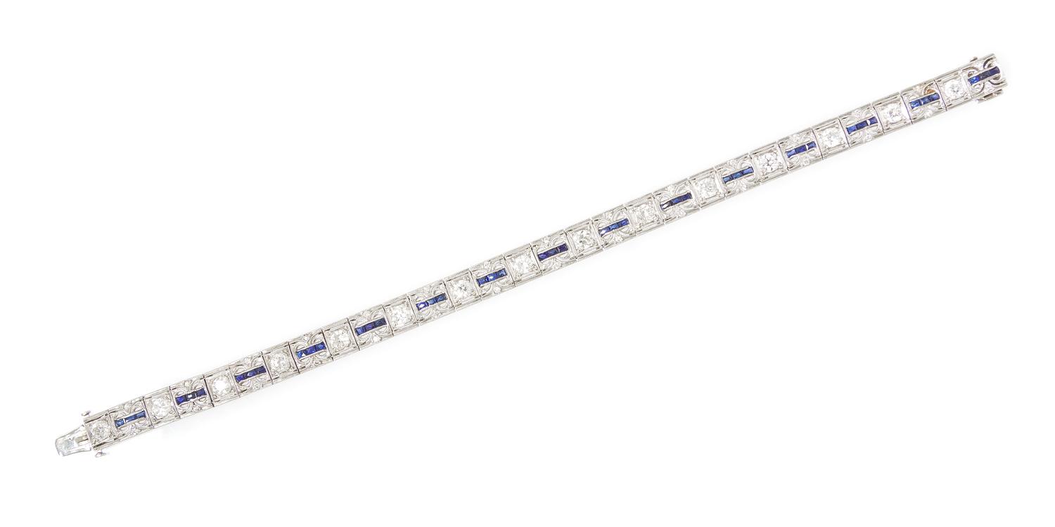 An Art Deco Platinum, Diamond and Synthetic Sapphire Bracelet, 14.50 dwts.