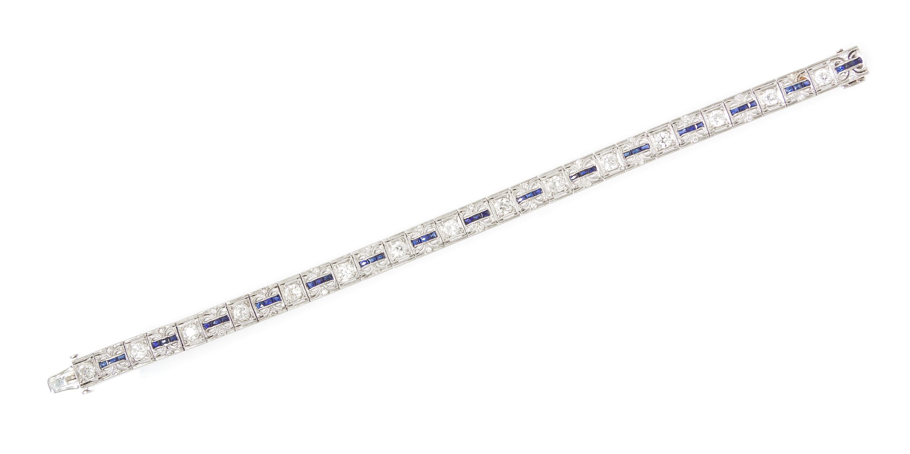 An Art Deco Platinum, Diamond and Synthetic Sapphire Bracelet, 14.50 dwts.