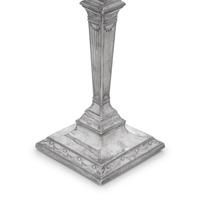 A Set of Four Neoclassical Silver Candlesticks