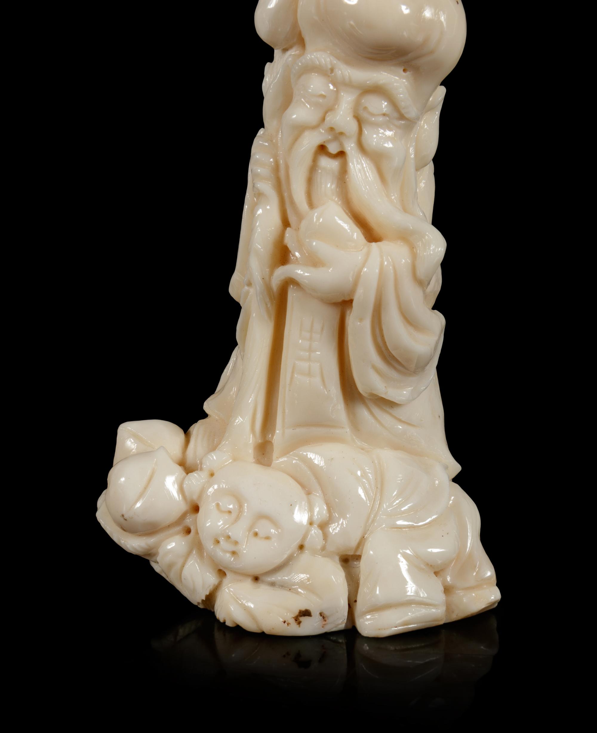 A White Coral Figure of Shoulao