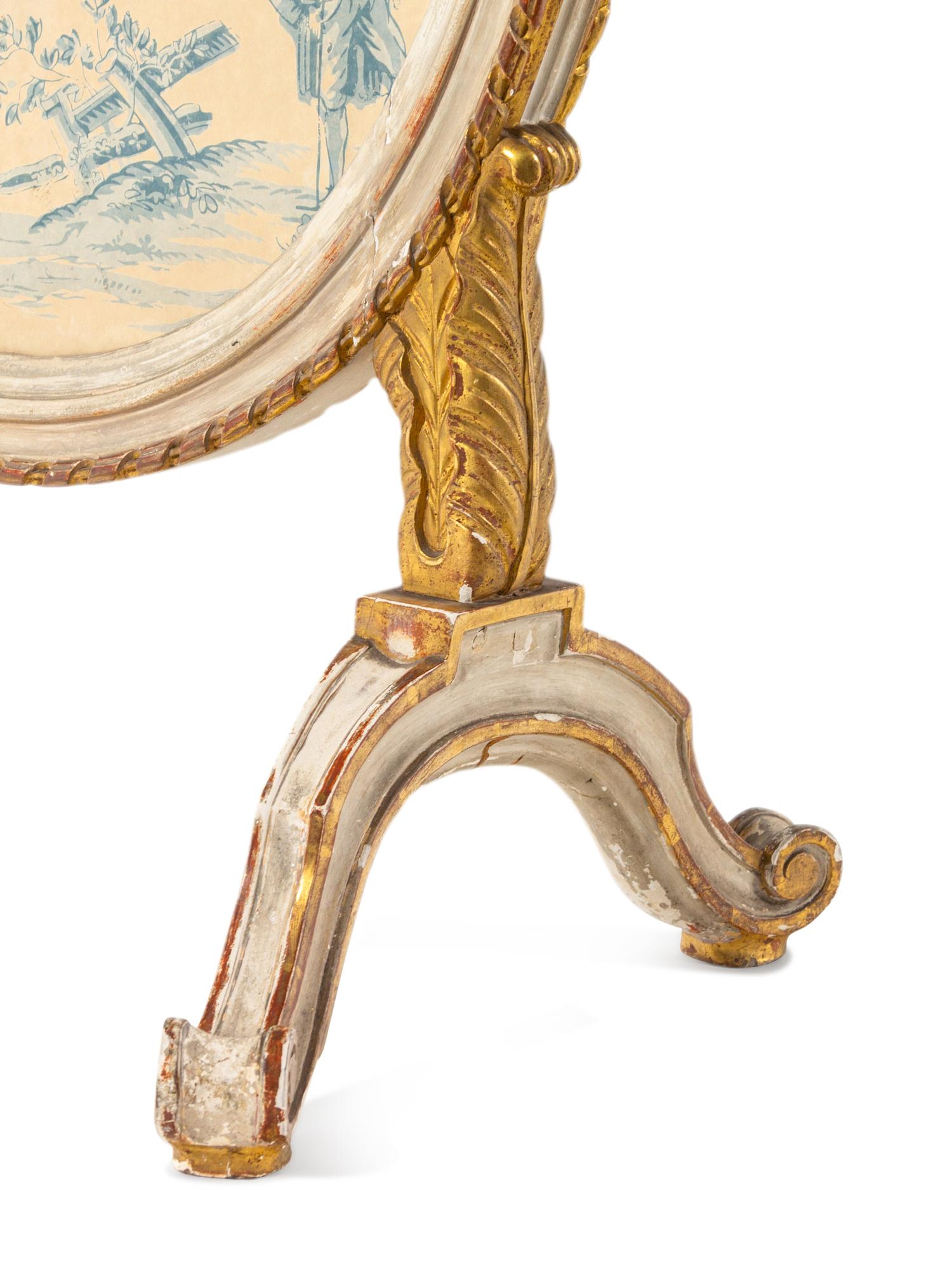 A Northern European White-Painted and Parcel-Gilt Oval Firescreen
