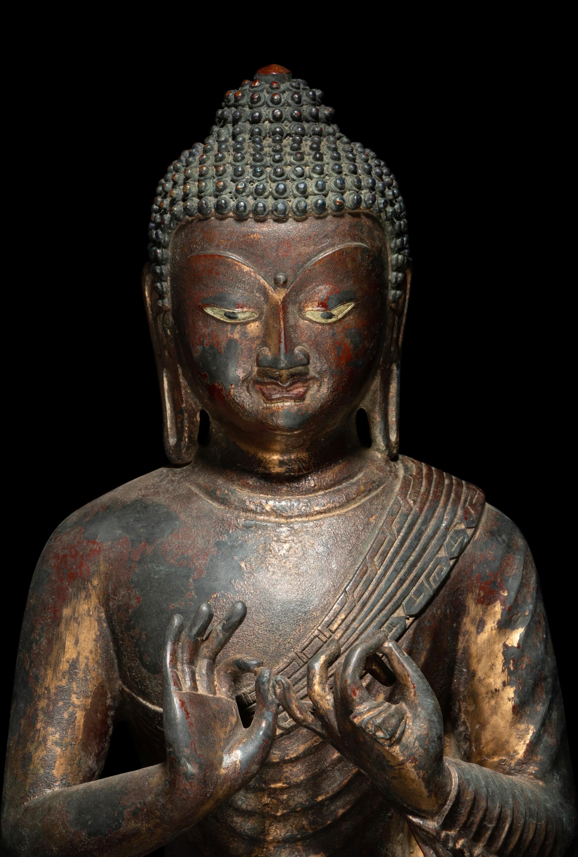 A Chinese Bronze Figure of Buddha