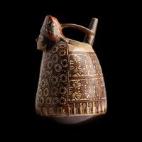 A Nazca-Huari Seated Figure Vessel