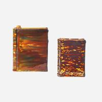 Two Rockingham or flint enamel glazed yellowware book-form flasks Probably Lyman Fenton & Co., Bennington, VT, circa 1850