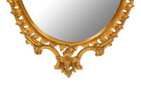 A Rococo Style Carved Giltwood Mirror