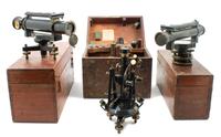 An English Black Lacquered Theodolite Length of longest scope 15 inches.