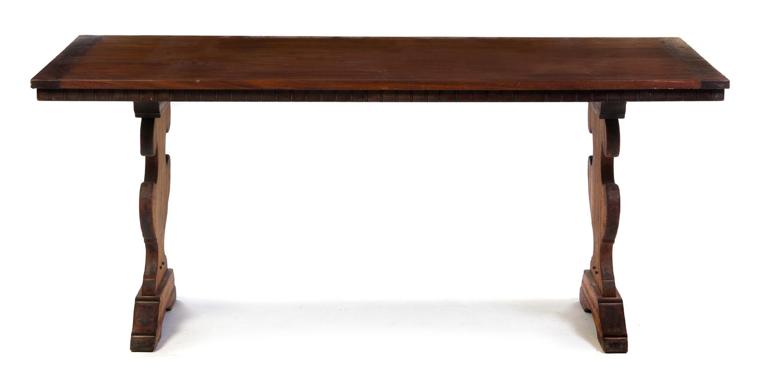 A Continental Various Woods Trestle Table, Height 30 1/2 x width 72 x depth 32 inches.
