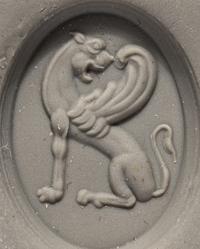 A Greco-Persian Style Bloodstone Intaglio with a Winged Griffin