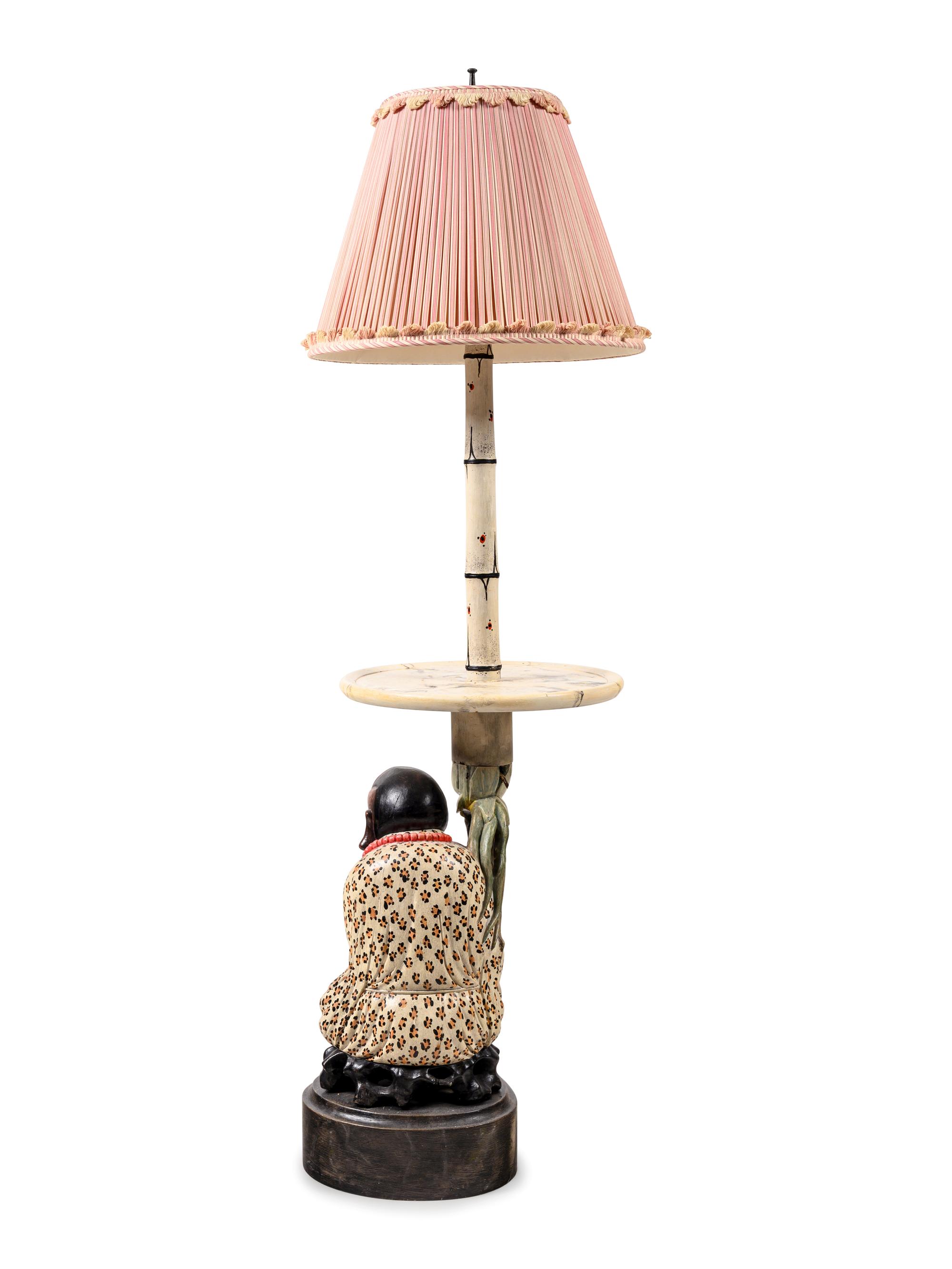 APPROVED FOR DONATION A Polychrome Decorated Figural Lamp Table