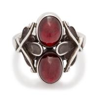 A Sterling Silver and Garnet Ring, Henry Pilstrup for Georg Jensen,