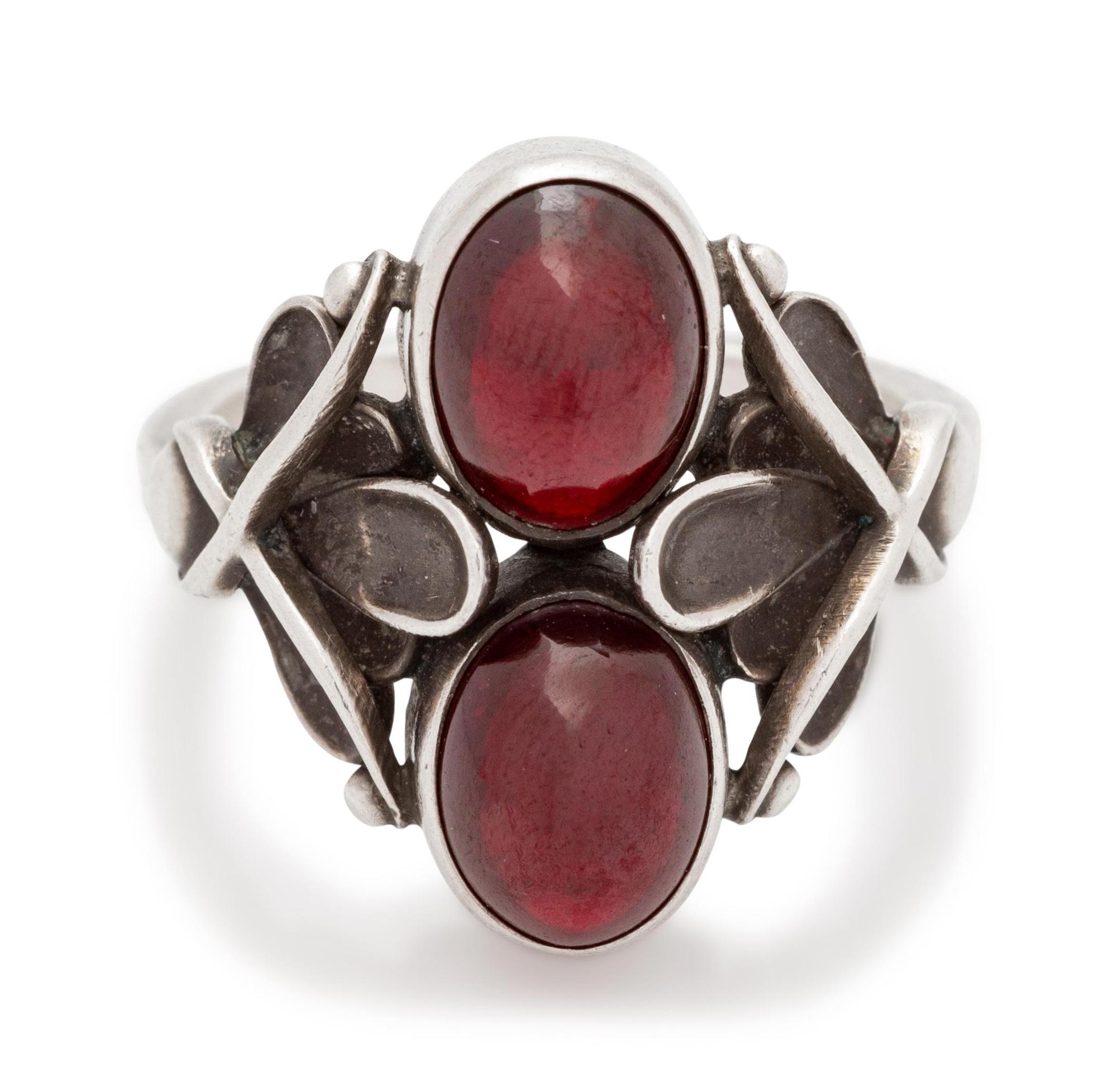 A Sterling Silver and Garnet Ring, Henry Pilstrup for Georg Jensen,