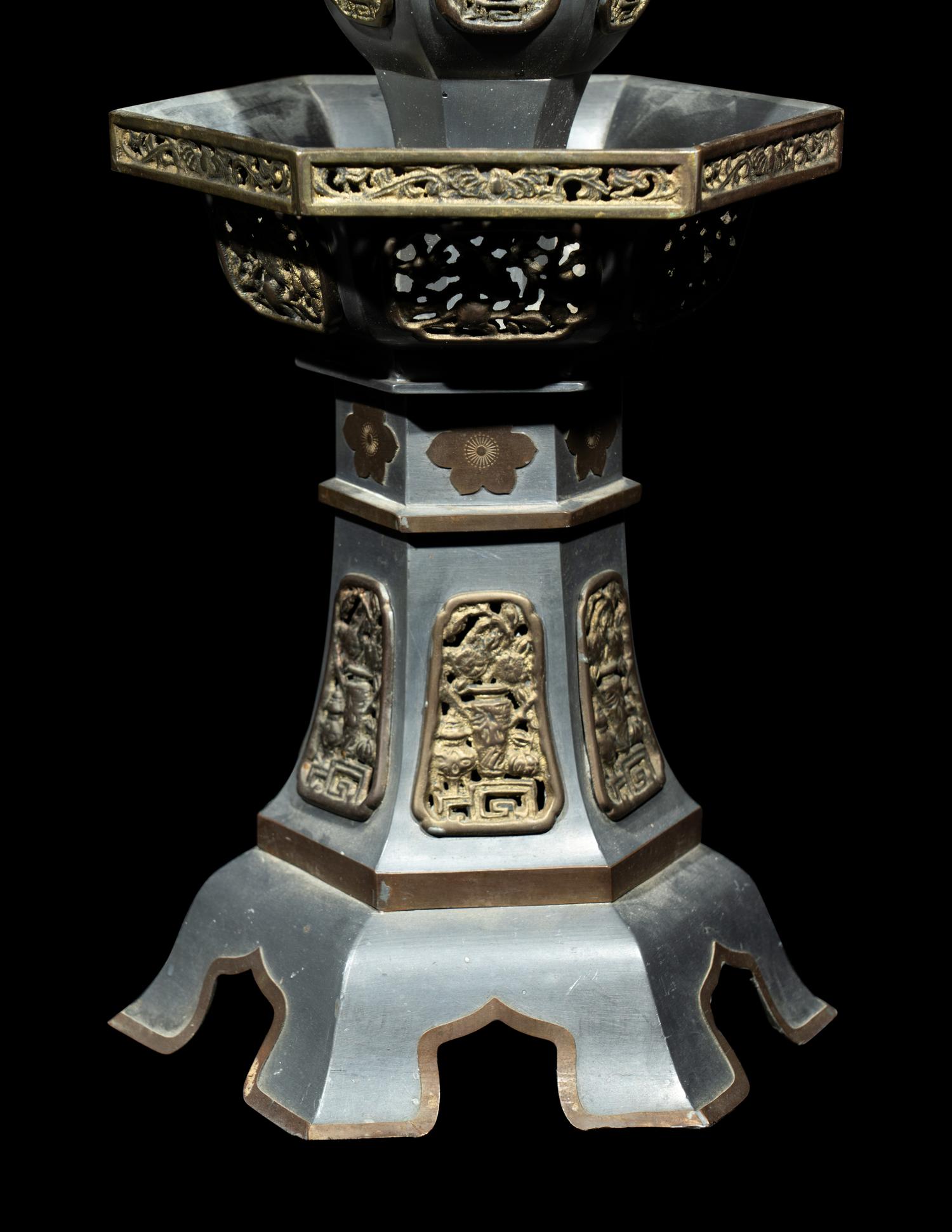 A Pair of Chinese Pewter Candle Holders