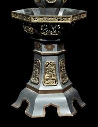 A Pair of Chinese Pewter Candle Holders