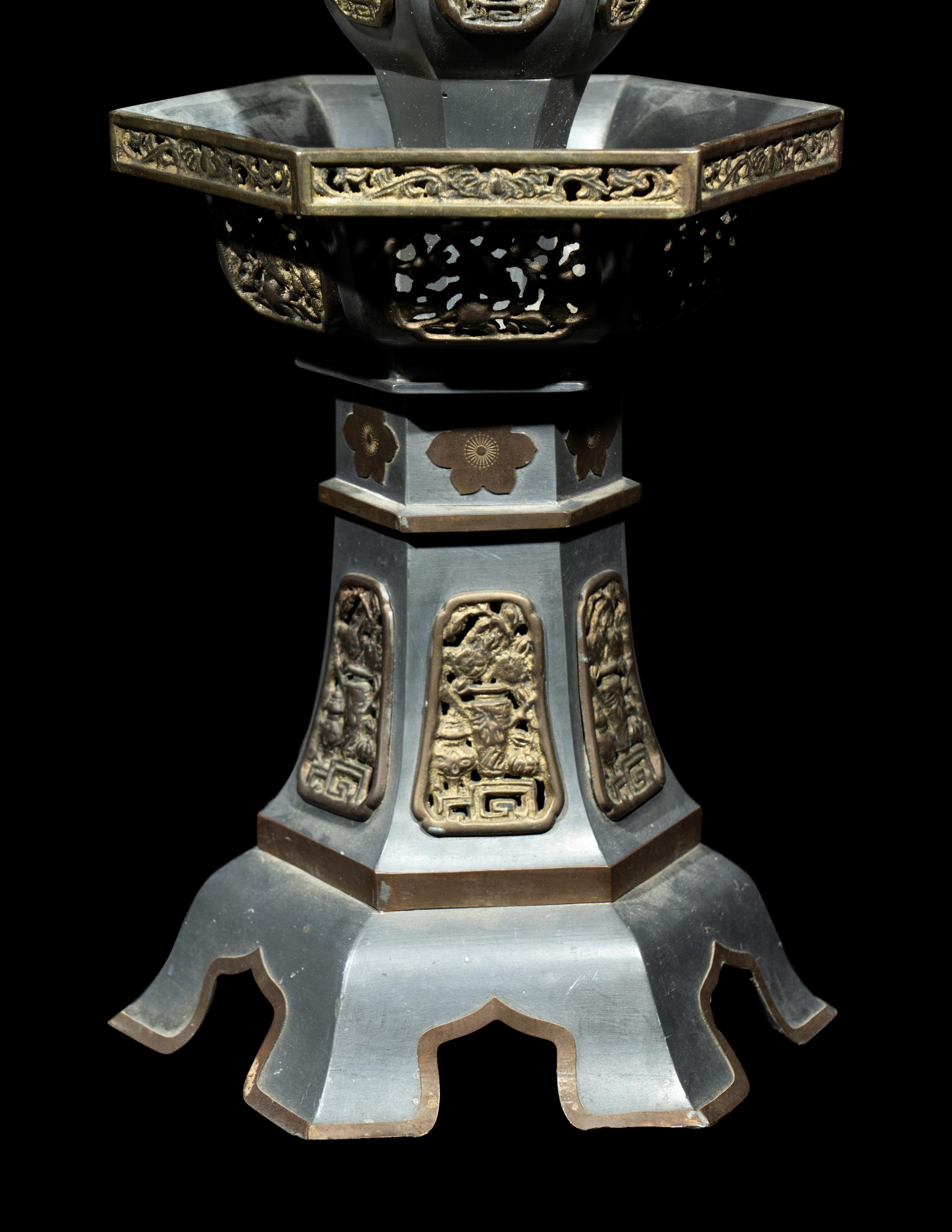 A Pair of Chinese Pewter Candle Holders