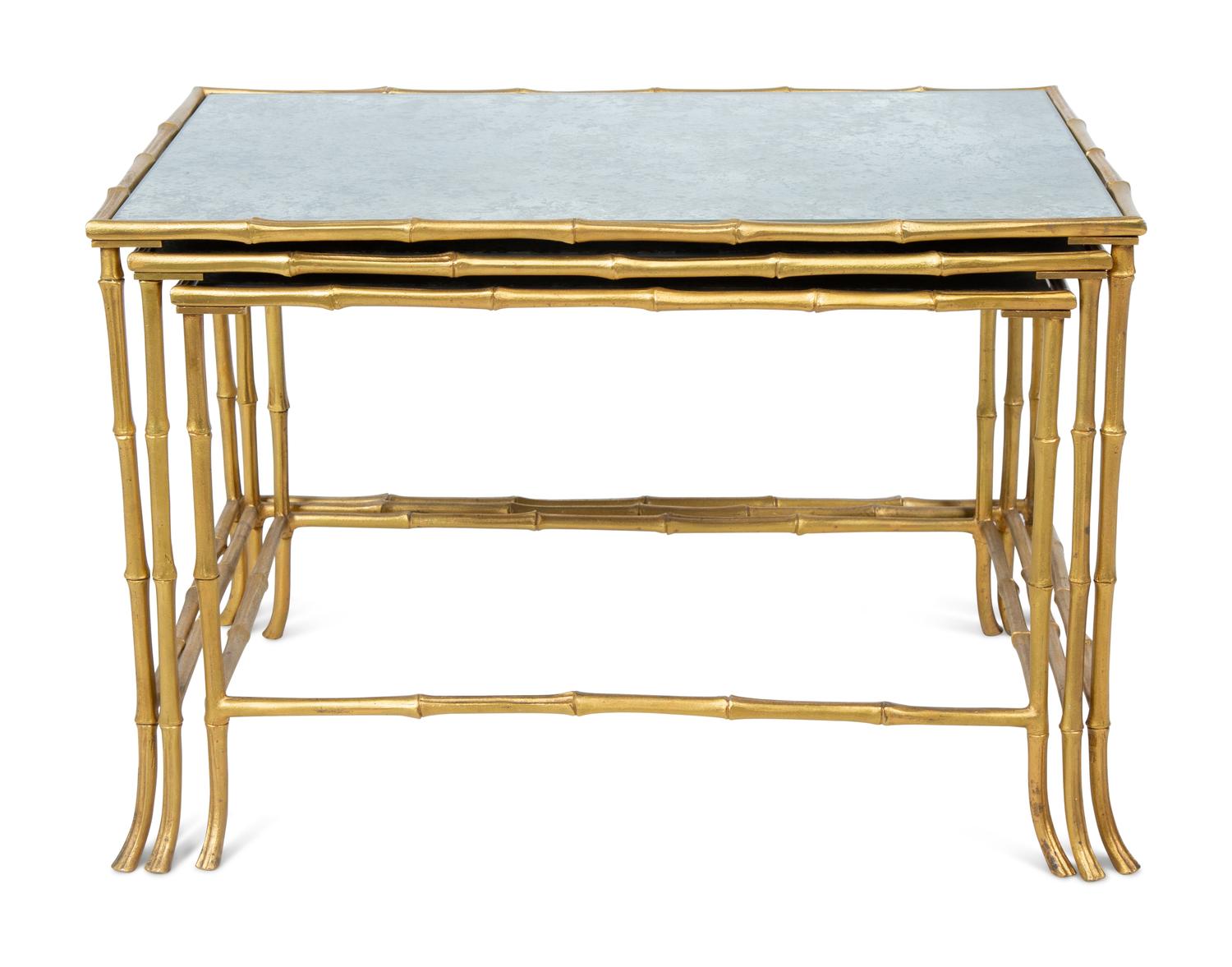 A Set of Three Gilt Metal Mirrored Nesting Tables in the Style of Maison Bagues