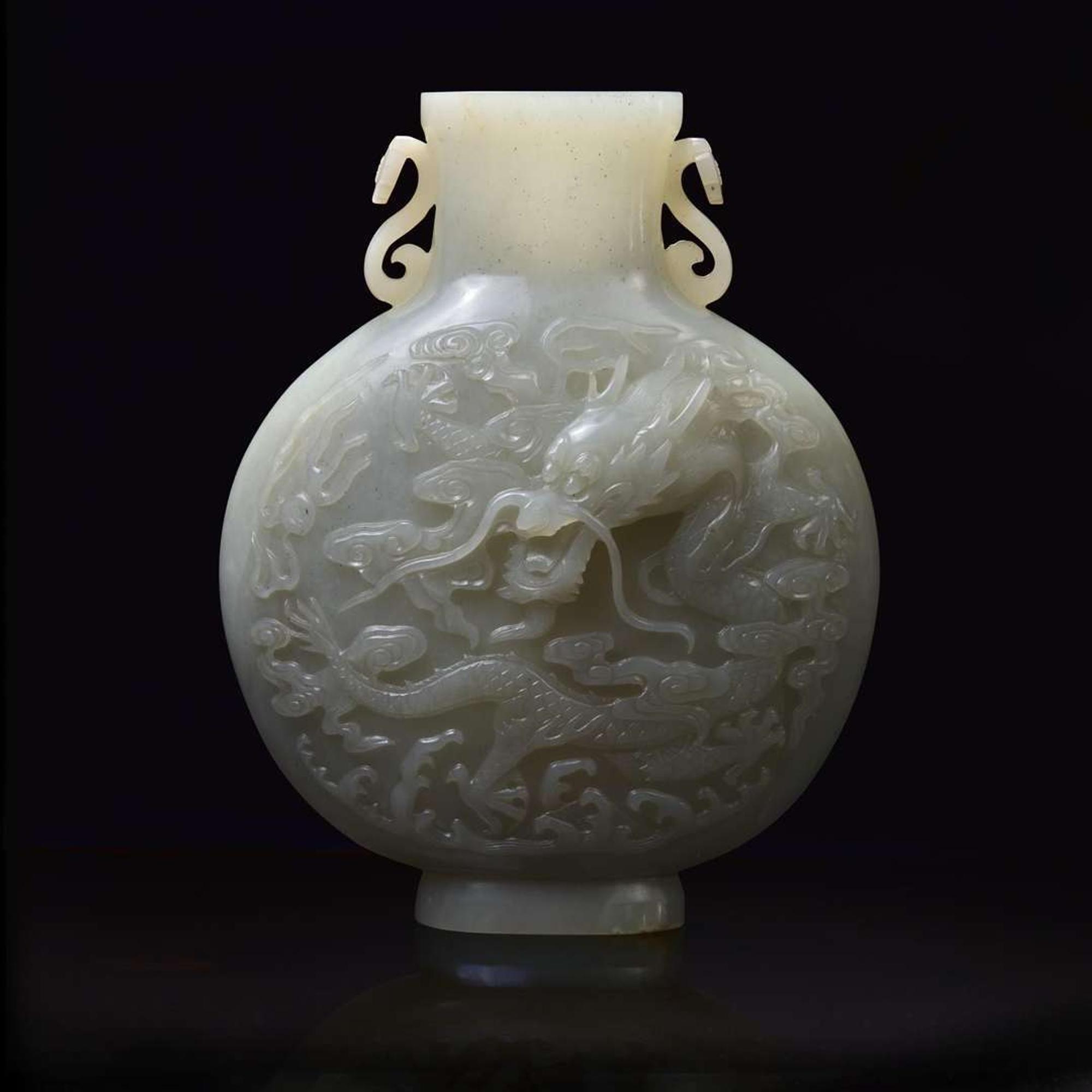 A Chinese carved celadon-grey jade "Dragon and Phoenix" moon-flask vase 青白玉龙凤纹抱月瓶