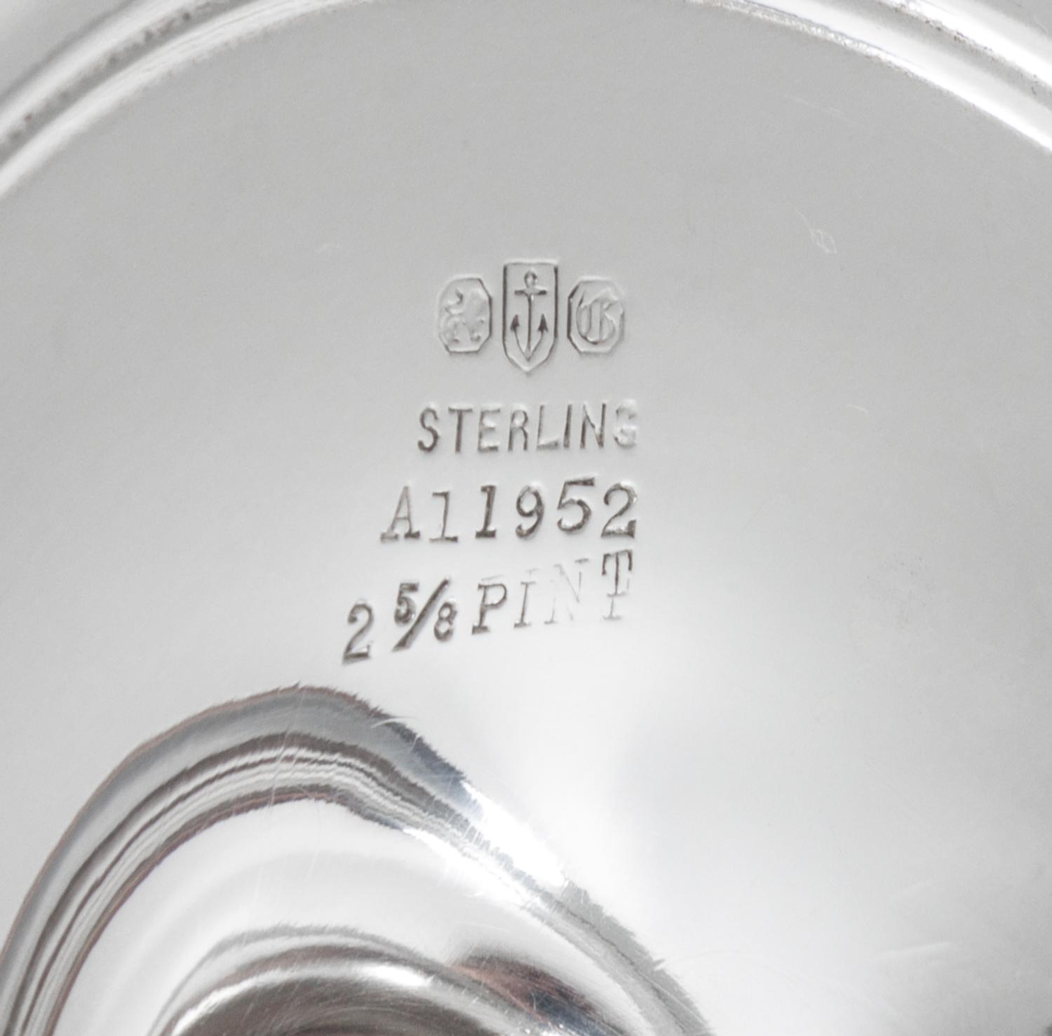 An American Silver Tea Service, Gorham Mfg. Co., Providence, RI, comprising a teapot, a creamer, a sugar and a waste bowl; together wit