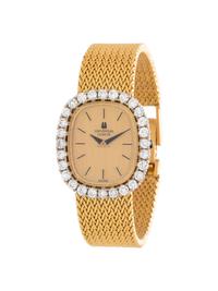 UNIVERSAL GENEVE, 18K YELLOW GOLD AND DIAMOND WRISTWATCH