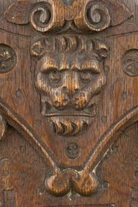 A Group of Three Carved Oak Figural Pilasters