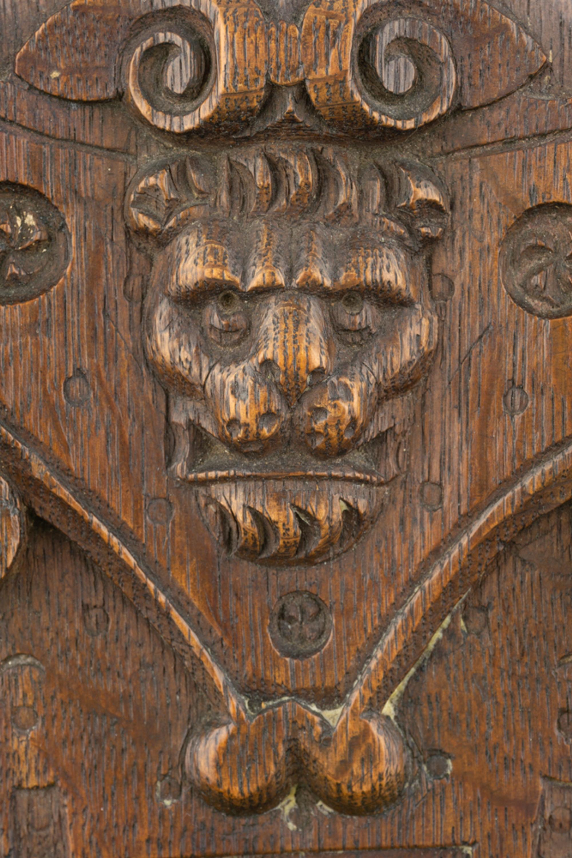 A Group of Three Carved Oak Figural Pilasters