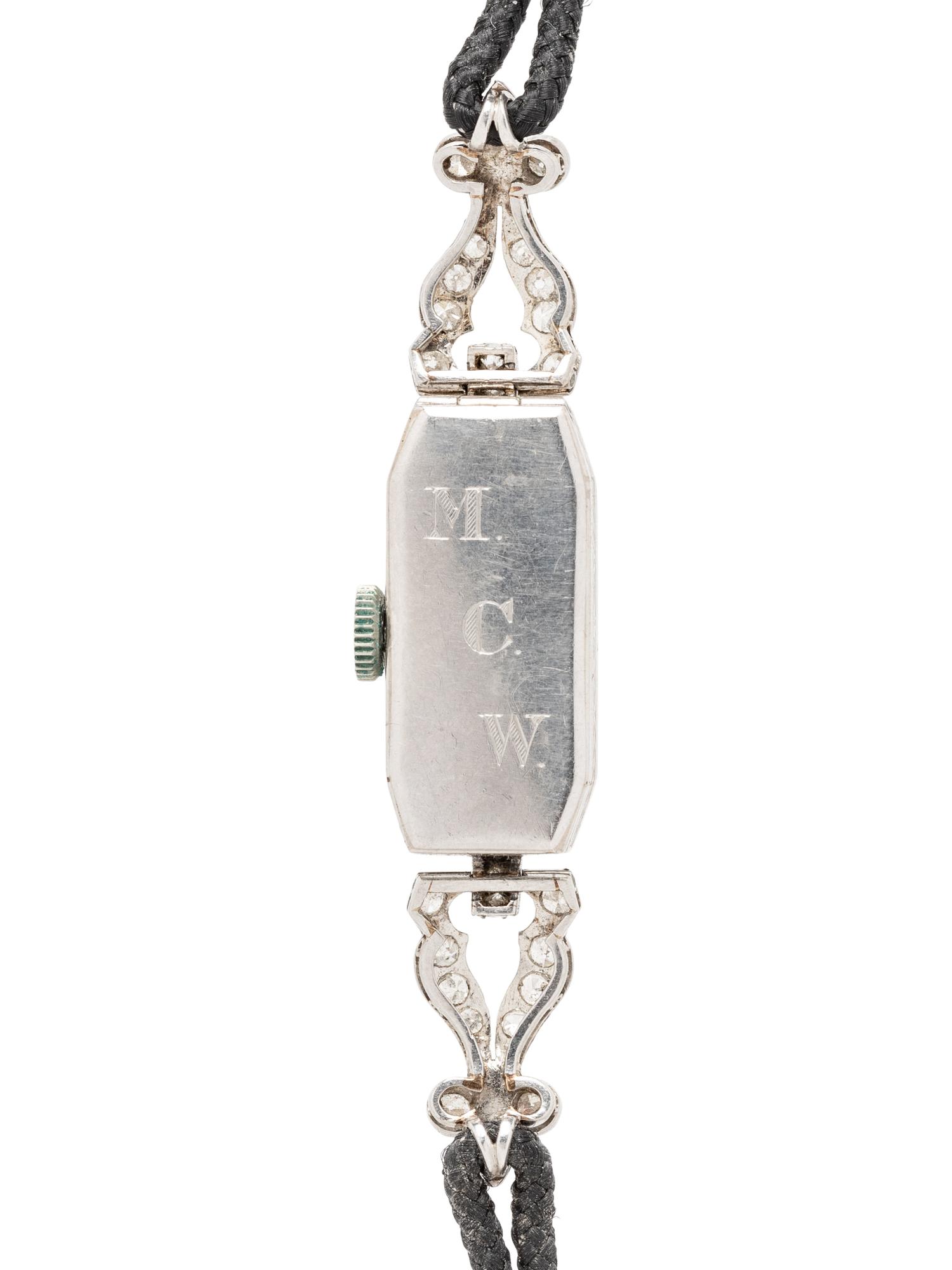 PLATINUM AND DIAMOND WATCH