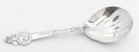A Silver Serving Spoon, Tiffany & Co., New York, NY, in the Medallion pattern.