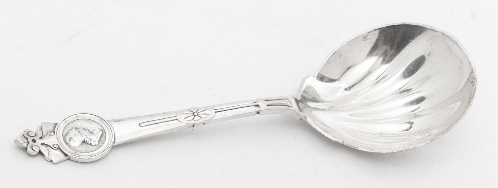 A Silver Serving Spoon, Tiffany & Co., New York, NY, in the Medallion pattern.