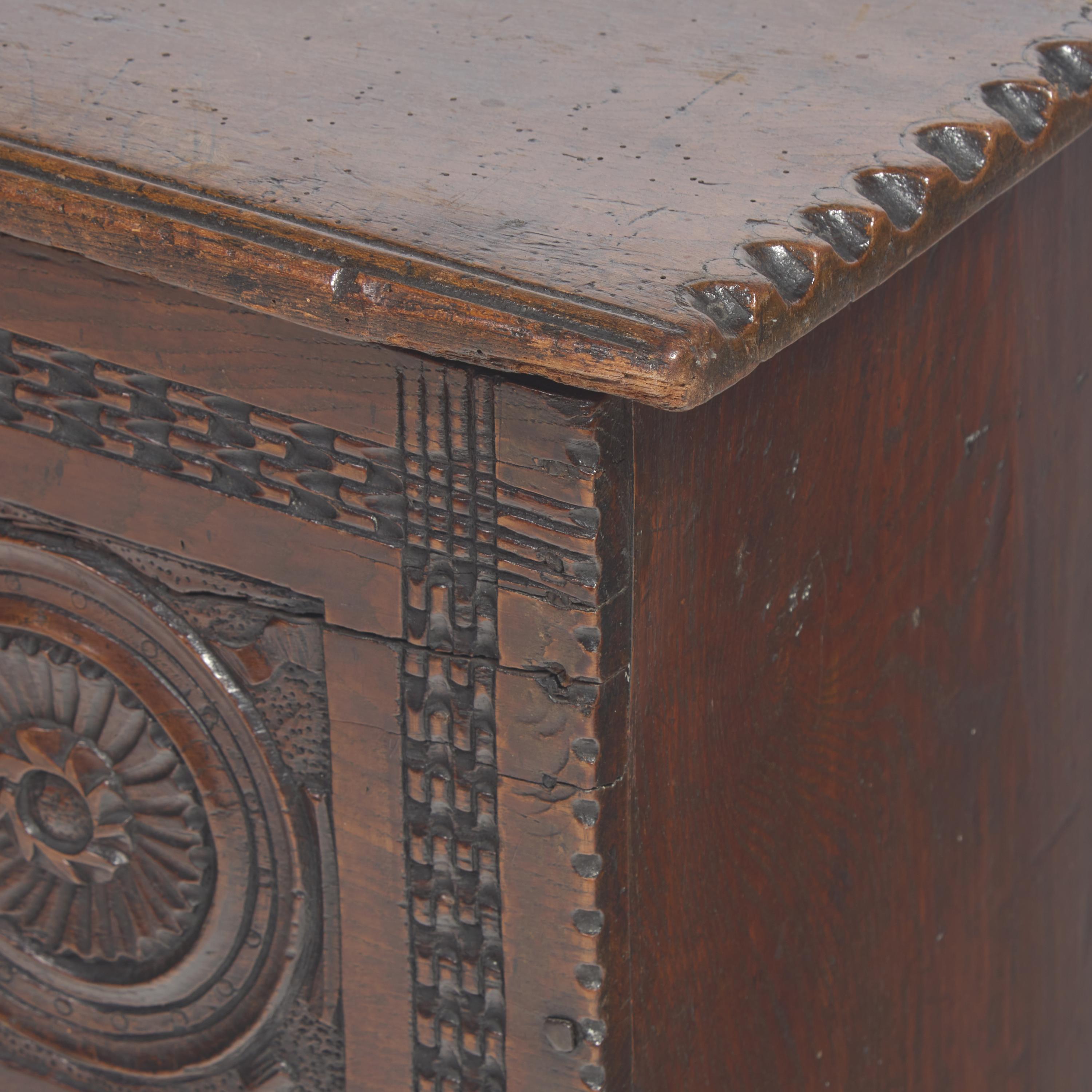 A Charles II Carved Oak Coffer