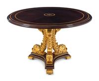A Karges Regency Style Dolphin Base Table
