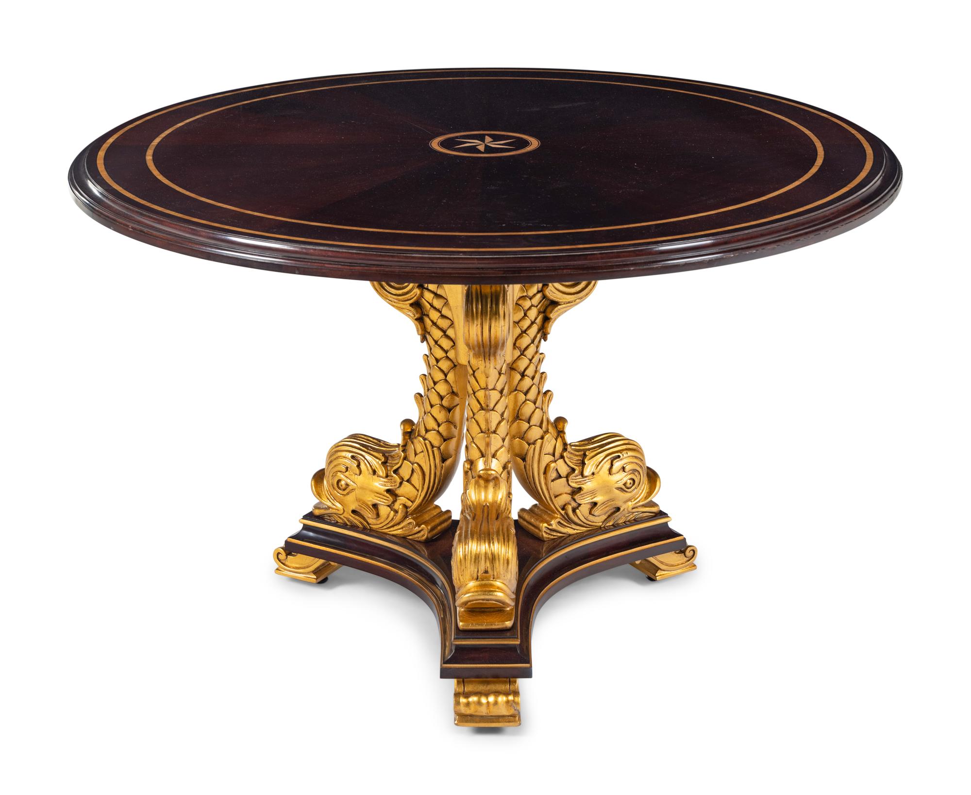 A Karges Regency Style Dolphin Base Table