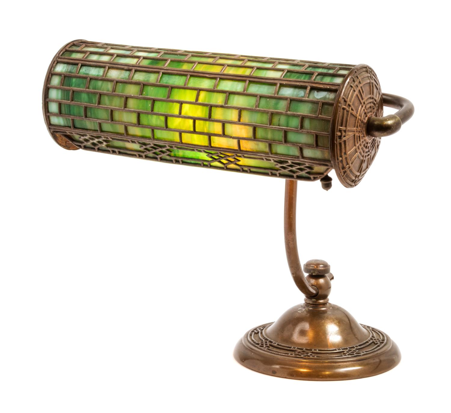Handel, EARLY 20TH CENTURY, an overlay slag glass and bronze desk lamp
