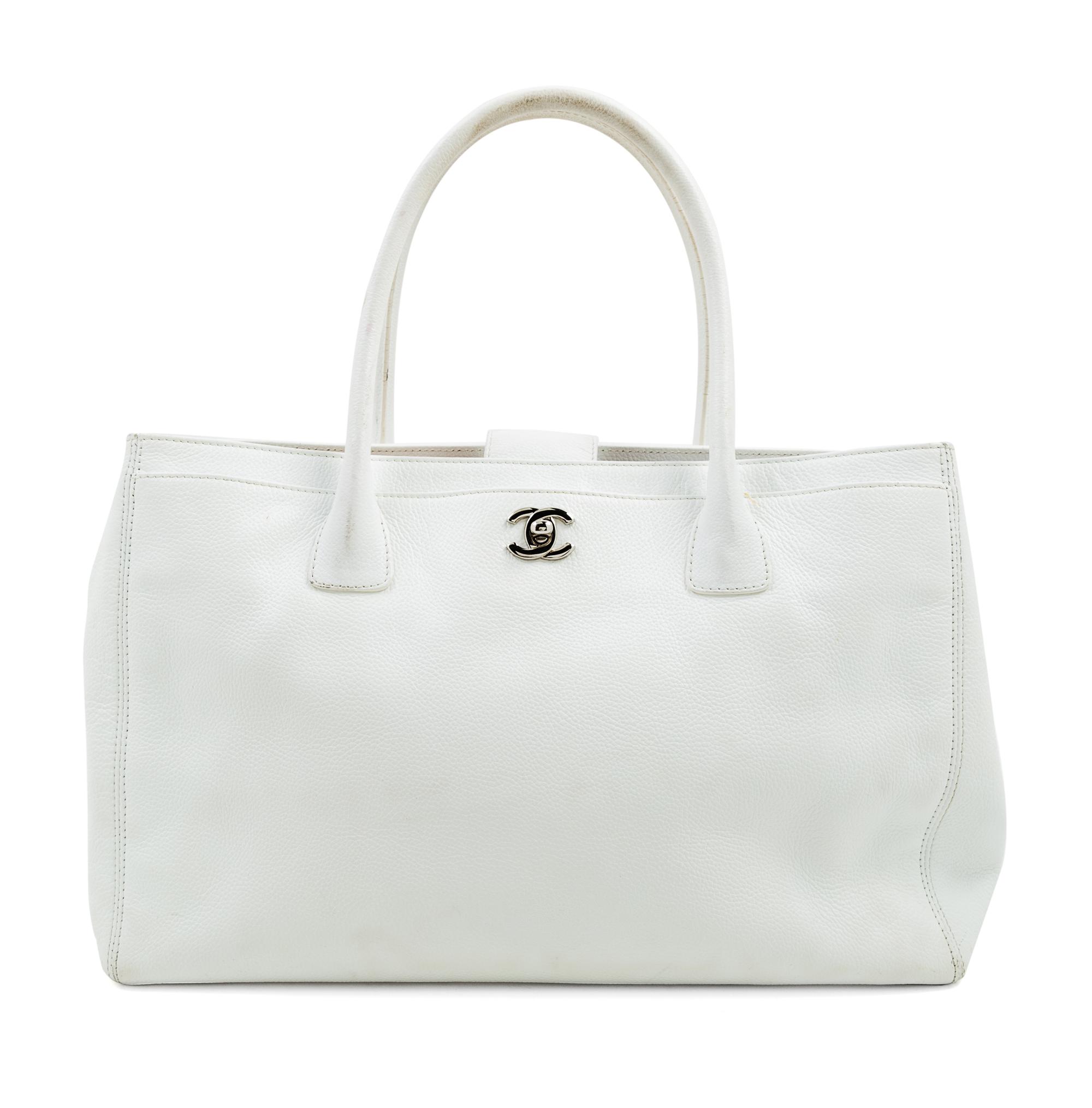 A Chanel White Caviar Tote Bag, 13.3" x 10" x 5.5"; Handle drop: 6.5".